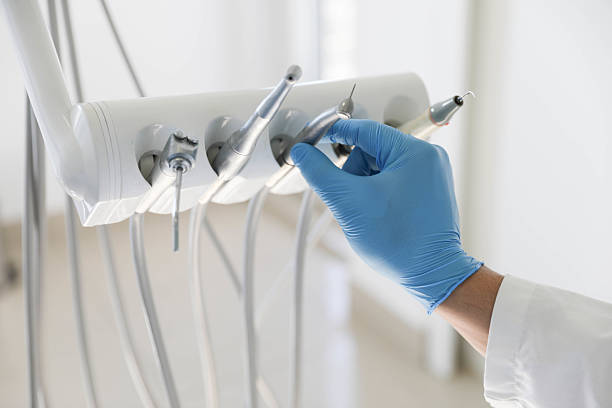 Professional Tooth Extraction technician working in Millington, MI